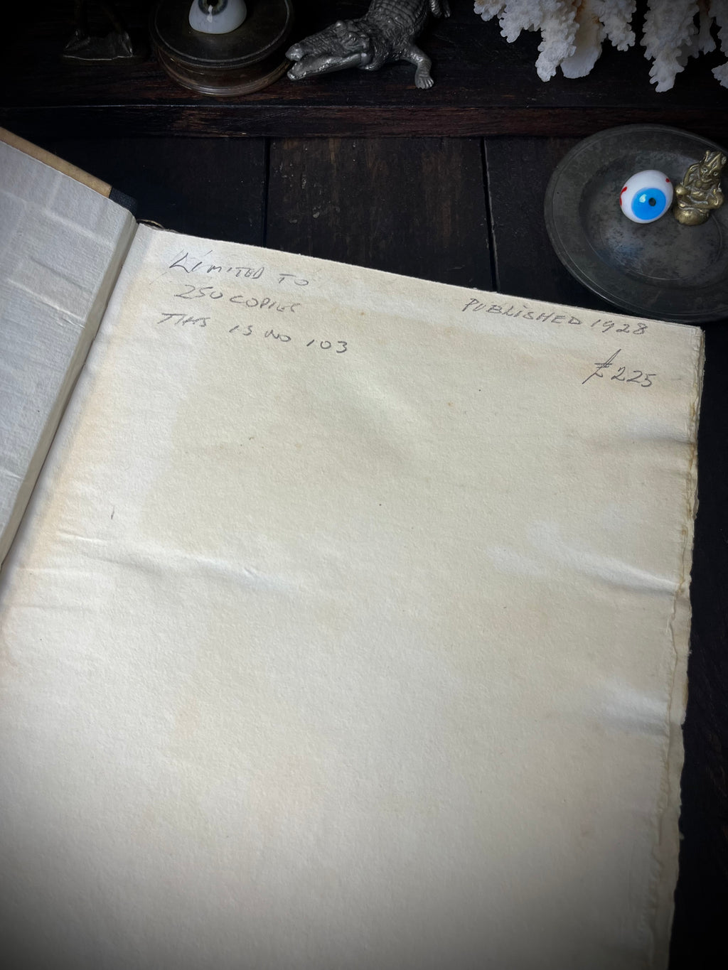 Endpaper of Pindar’s Odes of Victory with handwritten notes recording 1928 and copy 103 of 250.